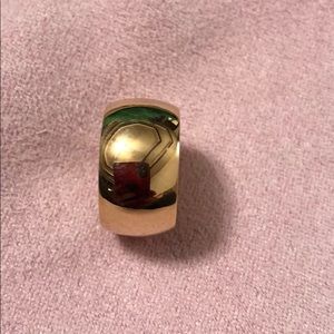 Lady’s 14 K yellow gold wide band.